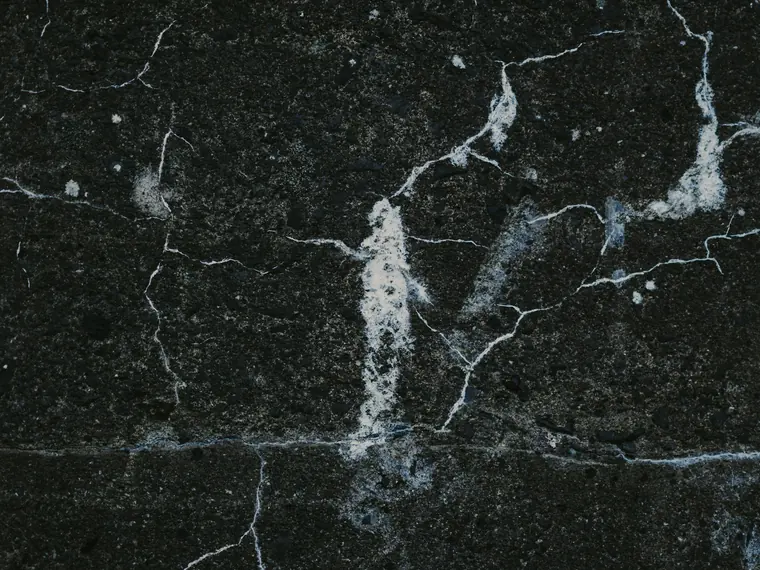 Cracked and broken concrete walking surface